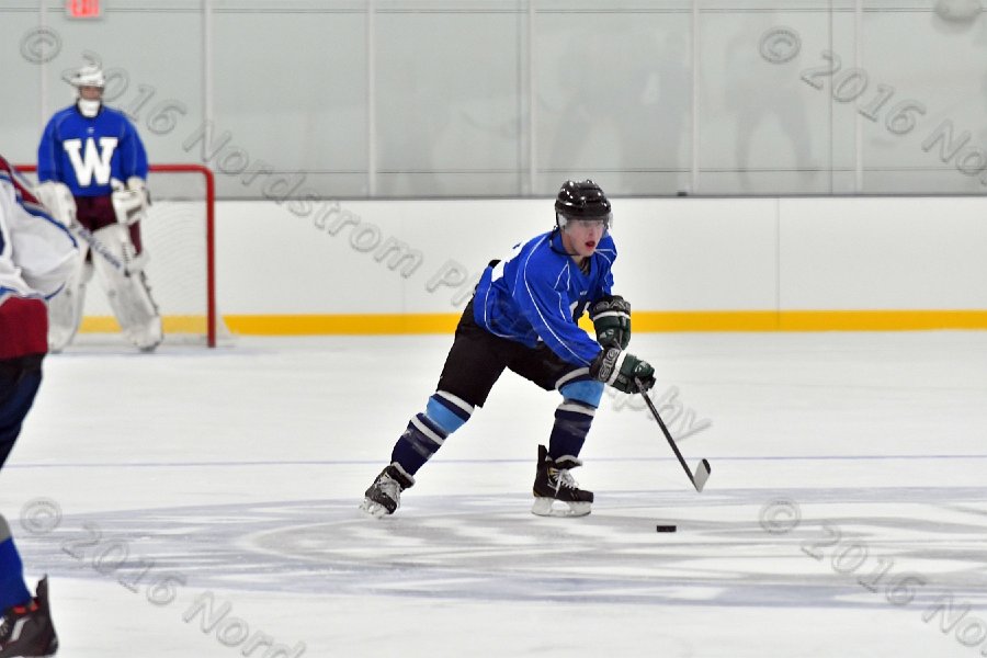 Wheaton College Men\'s Ice Hockey vs Middlesex Community College. - Photo By: KEITH NORDSTROM